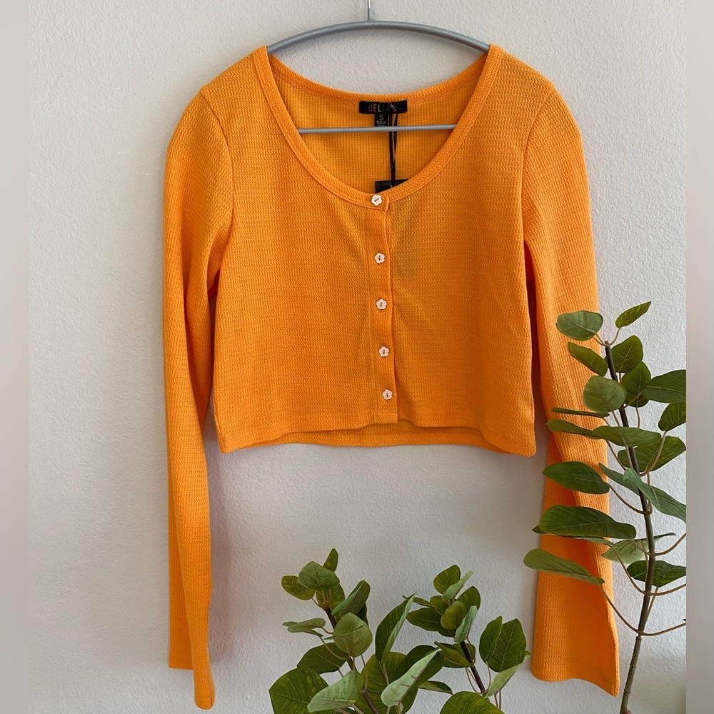 Delia’s Oh my clementine 🍊 waffle long sleeve crop top